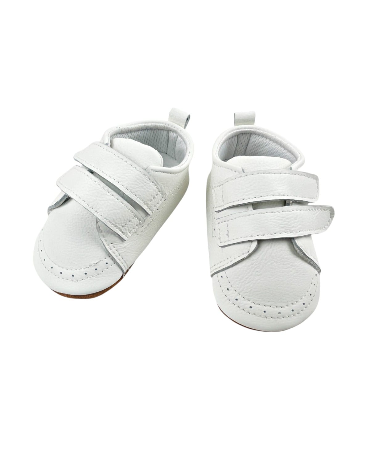 Zapatos bebé de cuero blanco ultraflexibles, vista aerea