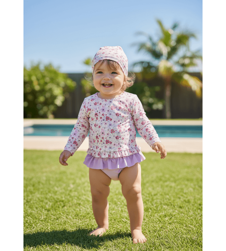 Traje de baño niña 3 piezas floral y lila con gorro