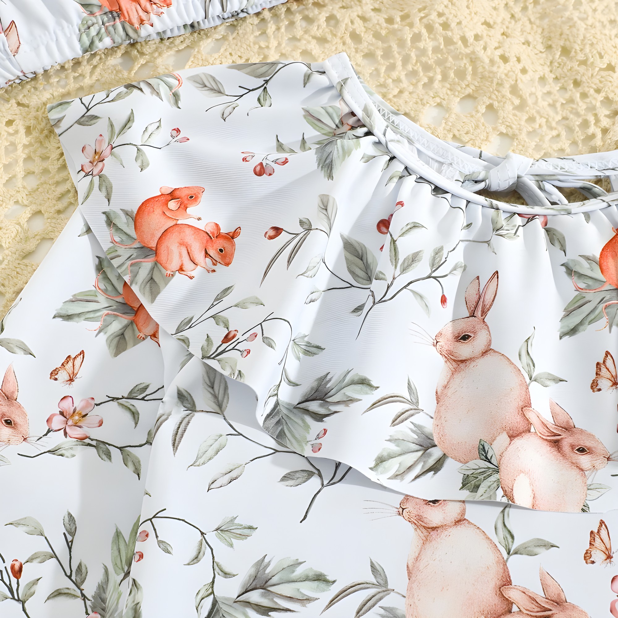 Traje de baño niña 2 piezas con diseño bosque – conejitos y ardillas