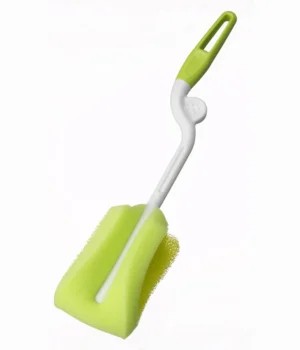 Cepillo giratorio con esponja Pigeon para limpiar mamaderas de bebé, diseño 360 grados con mango ergonómico.