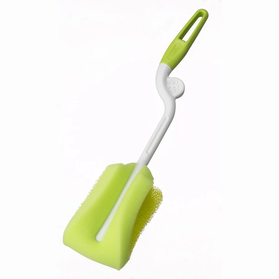 Cepillo giratorio con esponja Pigeon para limpiar mamaderas de bebé, diseño 360 grados con mango ergonómico.