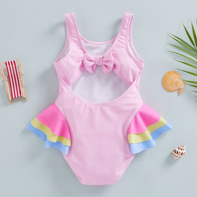 Traje de baño niña rosado con cisnes y roson en la espalda