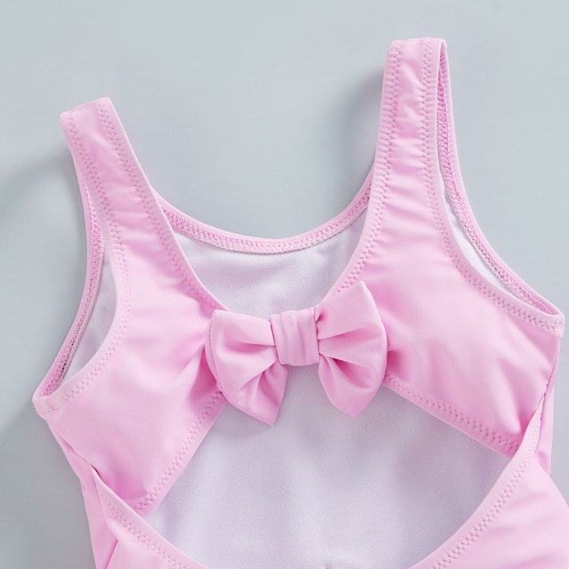 Traje de baño niña rosado con cisnes